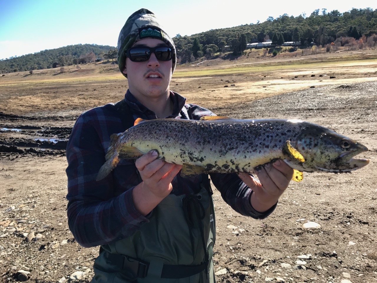 Photo of Joey with a nice brown caught spinning.